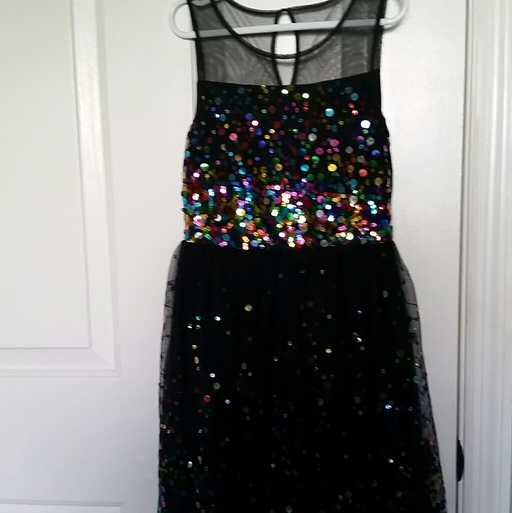 A black  dress with colorful shimmery circle's.